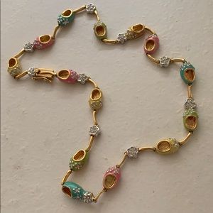 Gold necklace with colorful details